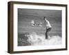 Surfer Riding a Wave While Wearing a Tuxedo-Allan Grant-Framed Photographic Print