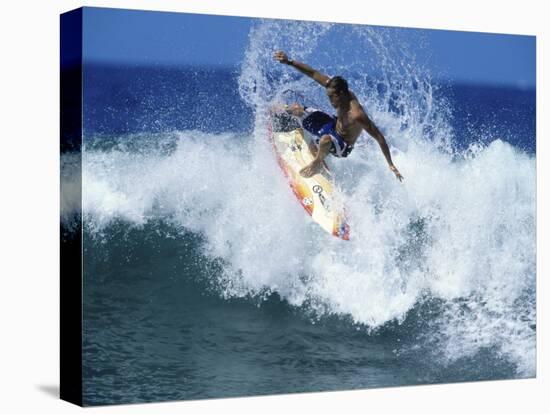 Surfer Riding a Wave-null-Stretched Canvas