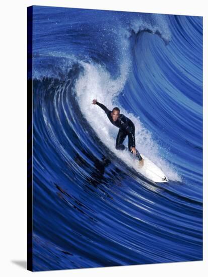 Surfer Riding a Wave-David Pu'u-Stretched Canvas