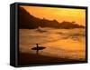 Surfer Standing at Waimea Bay at Sunset, Waimea, U.S.A.-Ann Cecil-Framed Stretched Canvas