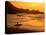 Surfer Standing at Waimea Bay at Sunset, Waimea, U.S.A.-Ann Cecil-Stretched Canvas