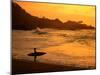 Surfer Standing at Waimea Bay at Sunset, Waimea, U.S.A.-Ann Cecil-Mounted Premium Photographic Print