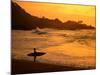Surfer Standing at Waimea Bay at Sunset, Waimea, U.S.A.-Ann Cecil-Mounted Photographic Print