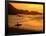 Surfer Standing at Waimea Bay at Sunset, Waimea, U.S.A.-Ann Cecil-Framed Photographic Print