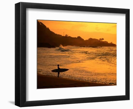 Surfer Standing at Waimea Bay at Sunset, Waimea, U.S.A.-Ann Cecil-Framed Photographic Print