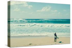 Surfer standing on the beach, North Shore, Oahu, Hawaii, USA-null-Stretched Canvas