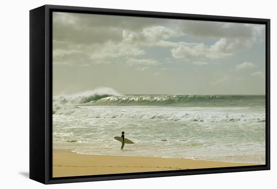 Surfer standing on the beach, North Shore, Oahu, Hawaii, USA-null-Framed Stretched Canvas