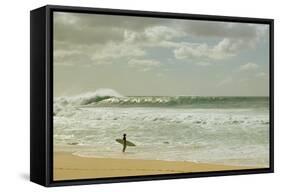 Surfer standing on the beach, North Shore, Oahu, Hawaii, USA-null-Framed Stretched Canvas