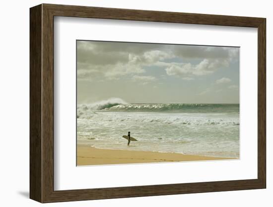 Surfer standing on the beach, North Shore, Oahu, Hawaii, USA-null-Framed Photographic Print