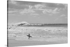 Surfer standing on the beach, North Shore, Oahu, Hawaii, USA-null-Stretched Canvas