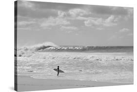 Surfer standing on the beach, North Shore, Oahu, Hawaii, USA-null-Stretched Canvas