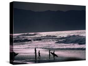 Surfers at Sunset, Ehukai, Oahu, Hawaii-Bill Romerhaus-Stretched Canvas