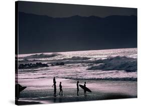 Surfers at Sunset, Ehukai, Oahu, Hawaii-Bill Romerhaus-Stretched Canvas