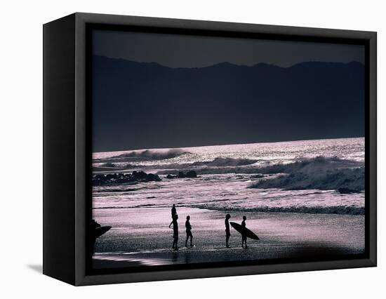 Surfers at Sunset, Ehukai, Oahu, Hawaii-Bill Romerhaus-Framed Stretched Canvas