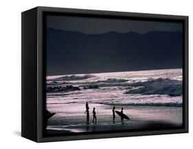 Surfers at Sunset, Ehukai, Oahu, Hawaii-Bill Romerhaus-Framed Stretched Canvas