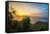 Surfers at sunset in Bali with straw roofed huts, Indonesia, Southeast Asia, Asia-Tyler Lillico-Framed Stretched Canvas