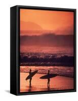Surfers at Sunset, Oahu, Hawaii-Bill Romerhaus-Framed Stretched Canvas