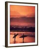 Surfers at Sunset, Oahu, Hawaii-Bill Romerhaus-Framed Premium Photographic Print