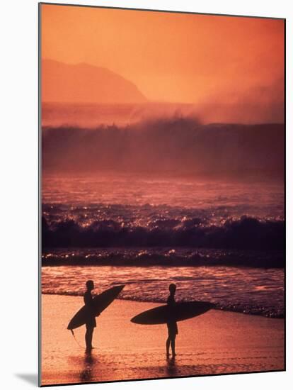 Surfers at Sunset, Oahu, Hawaii-Bill Romerhaus-Mounted Premium Photographic Print