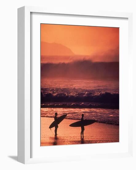 Surfers at Sunset, Oahu, Hawaii-Bill Romerhaus-Framed Photographic Print