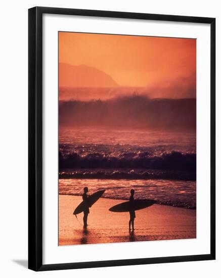 Surfers at Sunset, Oahu, Hawaii-Bill Romerhaus-Framed Photographic Print