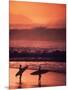 Surfers at Sunset, Oahu, Hawaii-Bill Romerhaus-Mounted Photographic Print