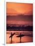 Surfers at Sunset, Oahu, Hawaii-Bill Romerhaus-Framed Photographic Print