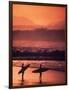 Surfers at Sunset, Oahu, Hawaii-Bill Romerhaus-Framed Photographic Print