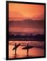 Surfers at Sunset, Oahu, Hawaii-Bill Romerhaus-Framed Photographic Print