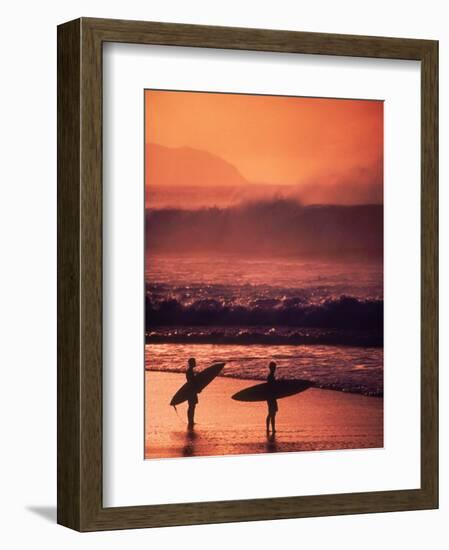 Surfers at Sunset, Oahu, Hawaii-Bill Romerhaus-Framed Photographic Print