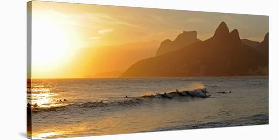 Surfers at Sunset on Ipanema Beach, Rio De Janeiro, Brazil-null-Stretched Canvas