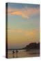 Surfers at Sunset on Playa Guiones Surf Beach-Rob Francis-Stretched Canvas