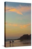 Surfers at Sunset on Playa Guiones Surf Beach-Rob Francis-Stretched Canvas