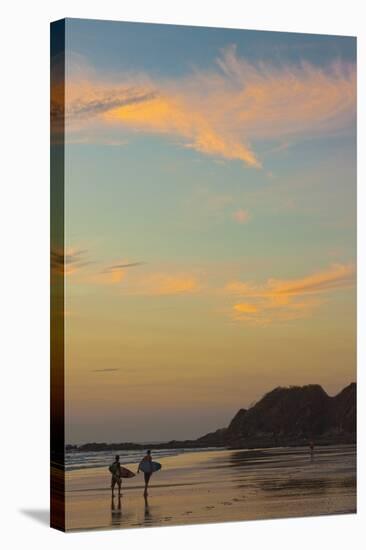 Surfers at Sunset on Playa Guiones Surf Beach-Rob Francis-Stretched Canvas