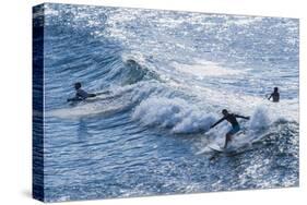Surfers at the Hookipa Beach Park, Paai, Maui, Hawaii, United States of America, Pacific-Michael Runkel-Stretched Canvas