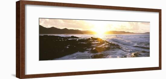 Surfers in the ocean at sunrise, Playa Los Cerritos, Cerritos, Baja California Sur, Mexico-Panoramic Images-Framed Photographic Print