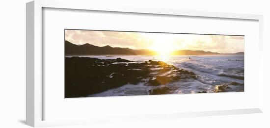 Surfers in the ocean at sunrise, Playa Los Cerritos, Cerritos, Baja California Sur, Mexico-Panoramic Images-Framed Photographic Print