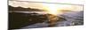 Surfers in the ocean at sunrise, Playa Los Cerritos, Cerritos, Baja California Sur, Mexico-Panoramic Images-Mounted Photographic Print