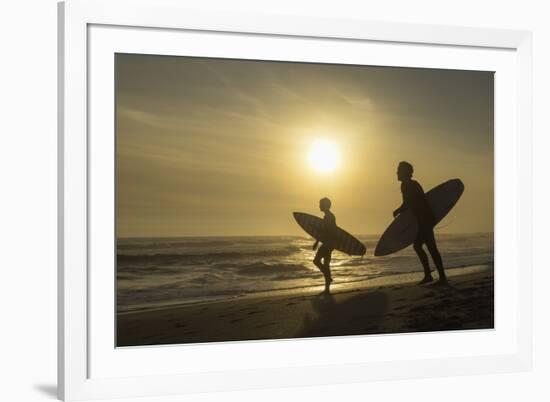 Surfers on Bloubergstrand at sunset, Cape Town, Western Cape, South Africa, Africa-Ian Trower-Framed Photographic Print