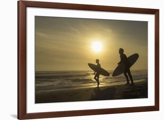 Surfers on Bloubergstrand at sunset, Cape Town, Western Cape, South Africa, Africa-Ian Trower-Framed Photographic Print