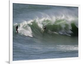Surfers Ride a Large Wave of Sydney's Manly Beach-null-Framed Photographic Print