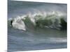 Surfers Ride a Large Wave of Sydney's Manly Beach-null-Mounted Photographic Print