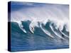 Surfers Ride a Wave at Waimea Beach on the North Shore of Oahu, Hawaii-null-Stretched Canvas