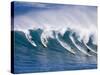 Surfers Ride a Wave at Waimea Beach on the North Shore of Oahu, Hawaii-null-Stretched Canvas