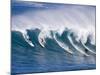 Surfers Ride a Wave at Waimea Beach on the North Shore of Oahu, Hawaii-null-Mounted Photographic Print