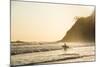 Surfers surfing on a beach at sunset, Nosara, Guanacaste Province, Pacific Coast, Costa Rica-Matthew Williams-Ellis-Mounted Photographic Print