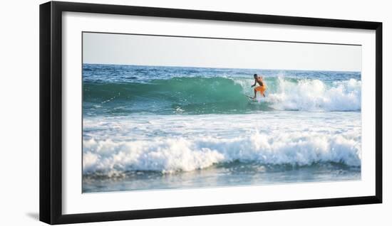 Surfers surfing on a beach, Nosara, Guanacaste Province, Pacific Coast, Costa Rica-Matthew Williams-Ellis-Framed Photographic Print