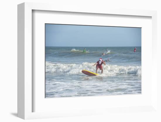 Surfing Santas, Cocoa Beach, Florida, USA-Lisa Engelbrecht-Framed Photographic Print
