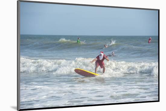 Surfing Santas, Cocoa Beach, Florida, USA-Lisa Engelbrecht-Mounted Photographic Print