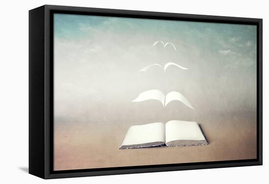 surreal book concept pages flying out of book-Francesco Chiesa-Framed Stretched Canvas